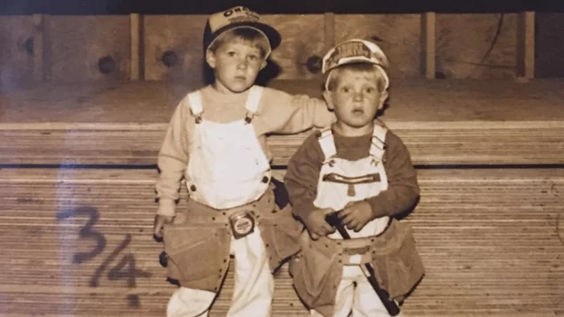 Two little boys at the Oman & Builder's Supply 