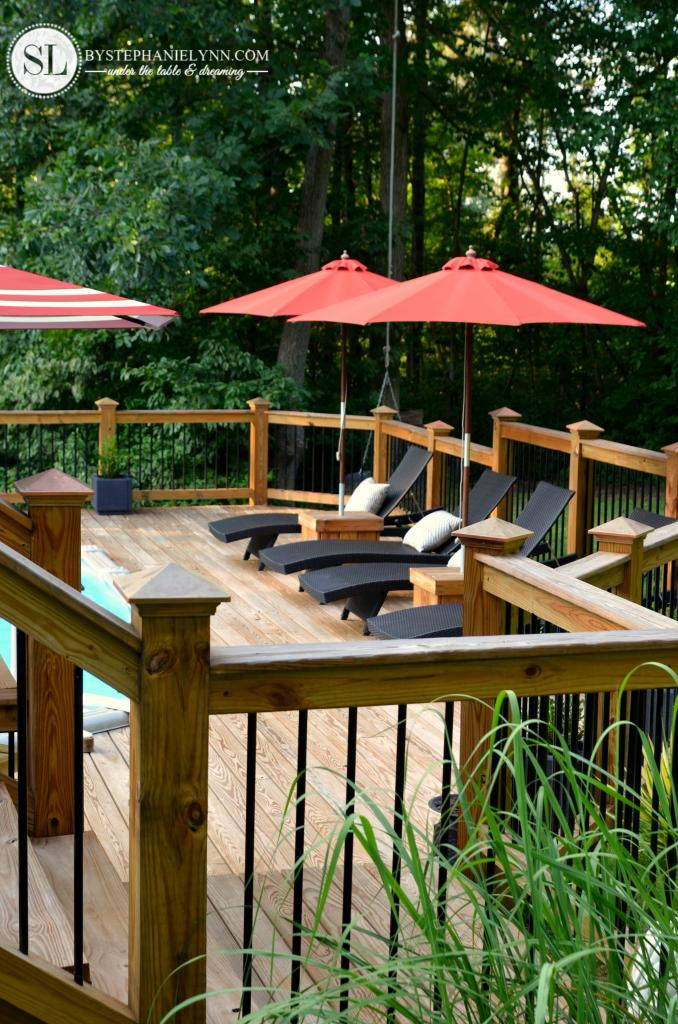 Lounge chairs around a pool area