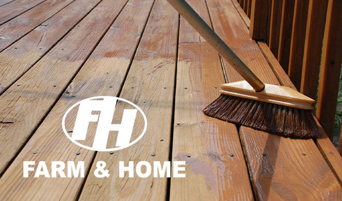 Farm & Home Logo with a stained deck
