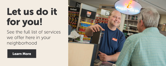Text left - "Let us do it for you!" Learn more. Right side is an employee helping a customer