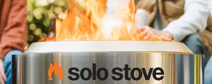 Solo Stove - people gathered around a silver smokeless fire pit