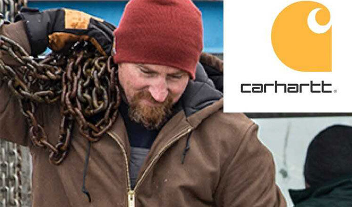 Man Holding Chains In a Carhartt Jacket On a Boat 