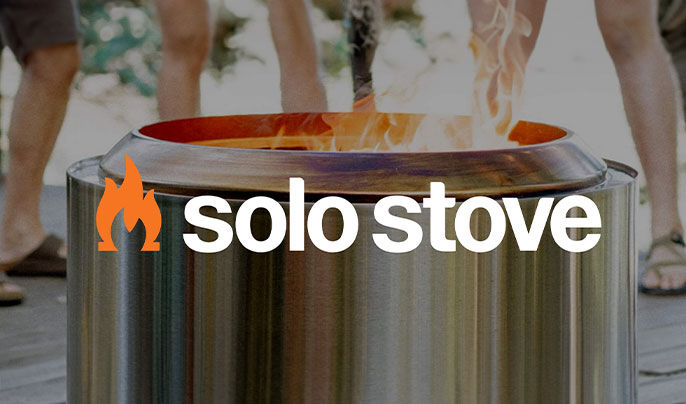 Solo Stove logo - people gathered around a silver smokeless fire pit