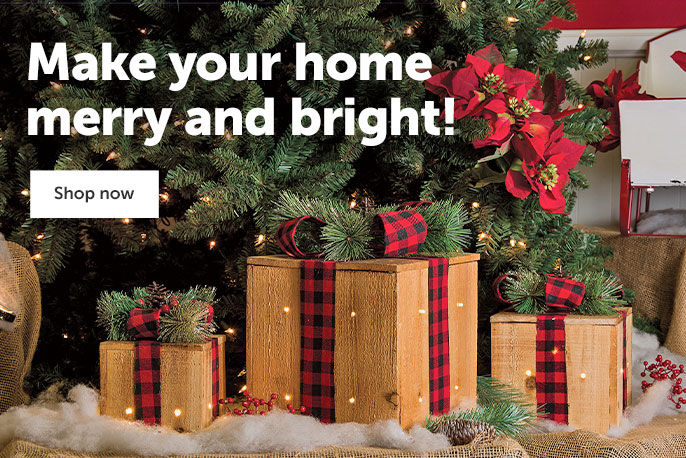 Text on the left, "Make your home merry and bright!" A "Shop Now" button with a three burlap presents under a Christmas tree