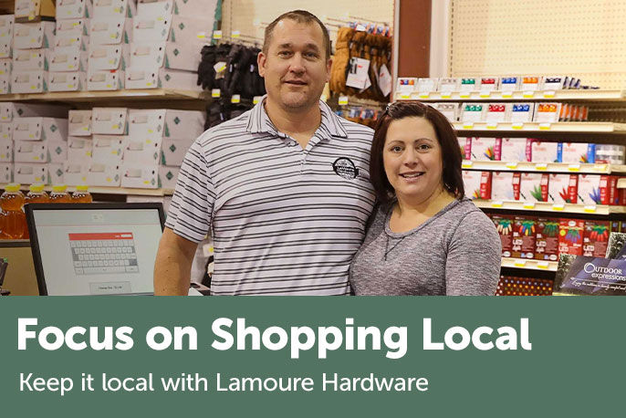 Text on the left, Focus on Shopping Local. Keep it local with Lamoure Hardware - Image right, Owners of Lamoure Hardware inside the store