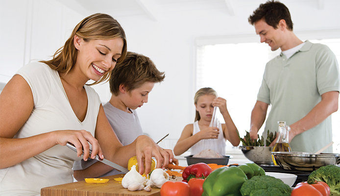 A family making dinner together