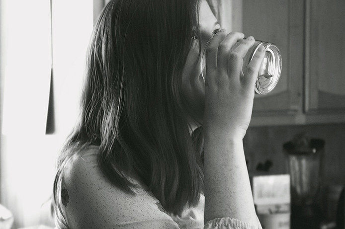 Woman drinking a glass of water