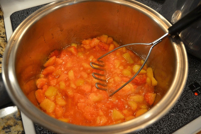 Mashing peaches 