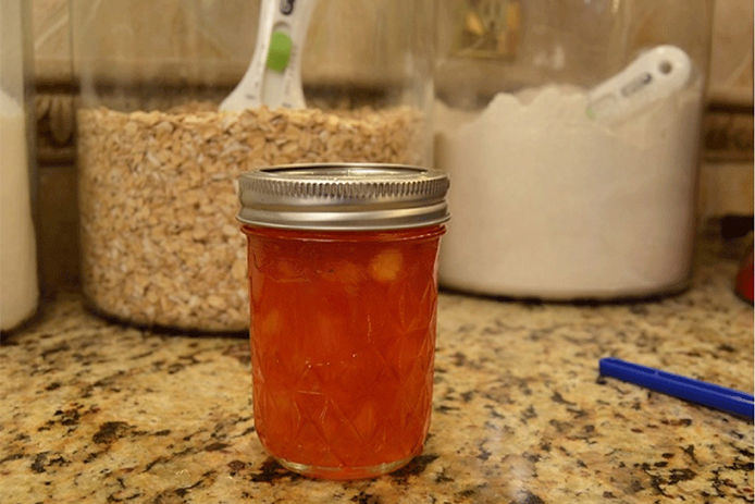 Jar of peach preserves