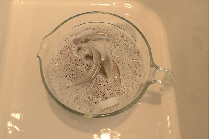 Jars and lids in a hot water bath