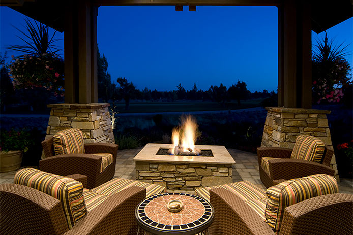 Backyard patio with a fire pit