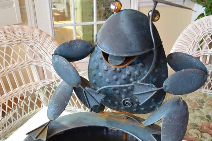 rusted frog fountain