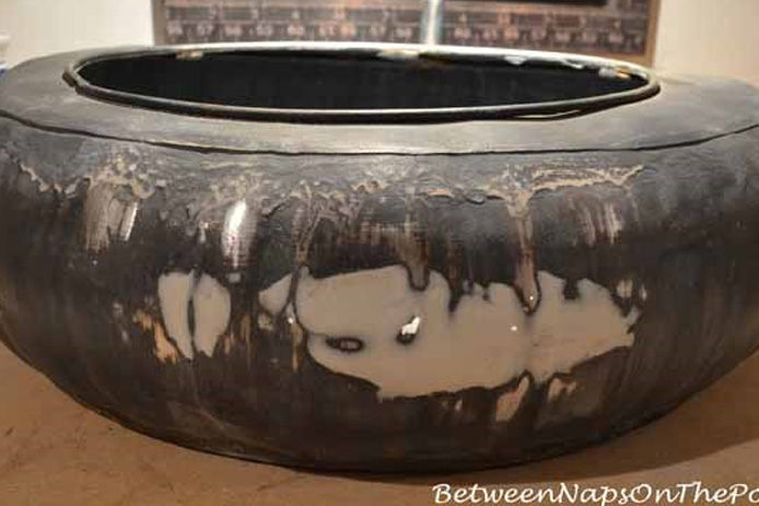 metal frog fountain after putty was used to fill in spots