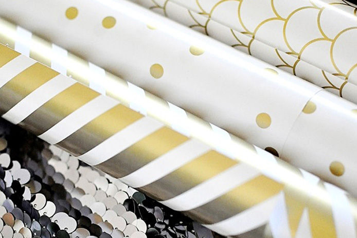 Rolls of wrapping paper for DIY gallery wall