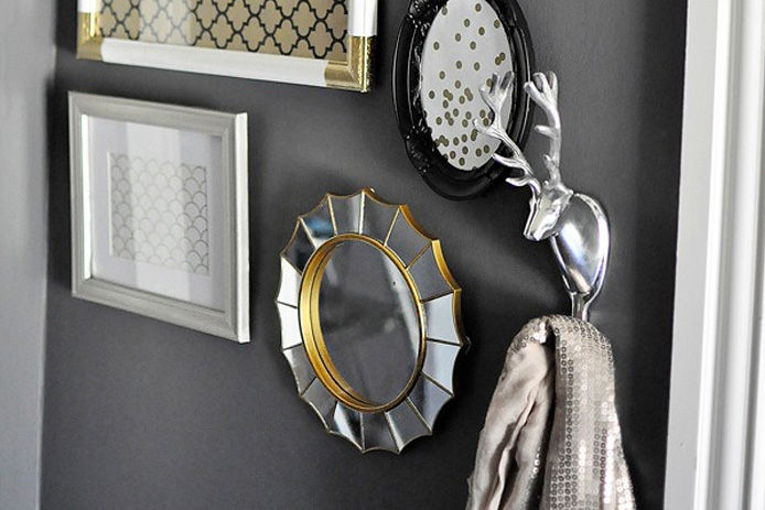 Finishes DIY gallery wall in home