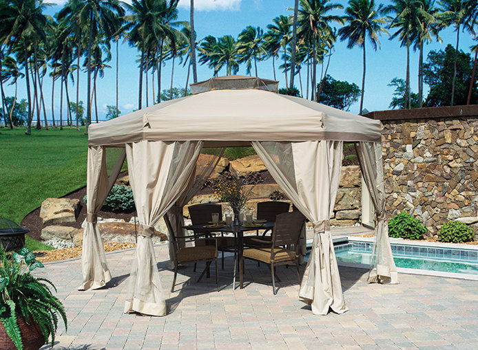 An outdoor gazebo by the pool