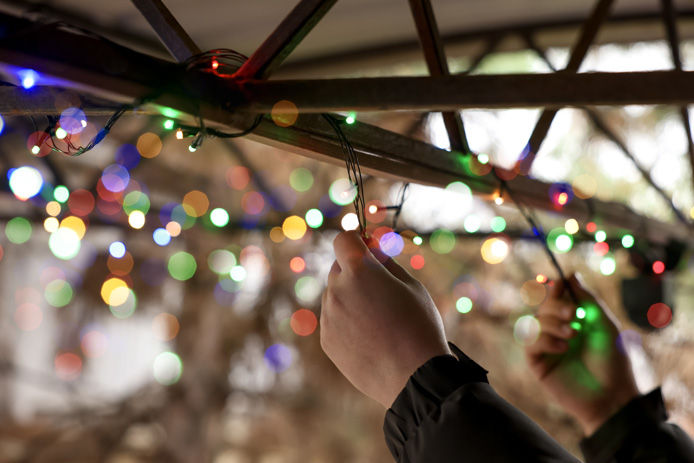 holiday led lights being hung