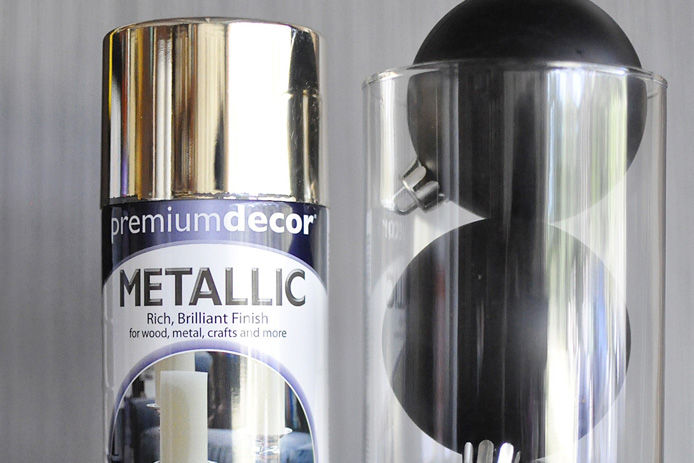 metallic spray paint and black ornaments