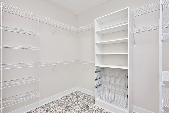 closet with wire shelves and organizers
