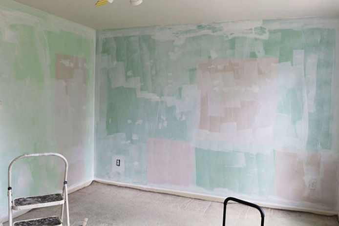 Green wall with one coat of primer