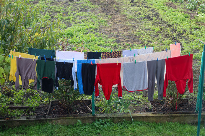 pole to pole clothesline with clothes drying on it