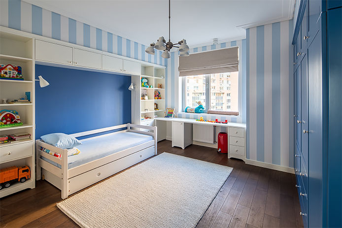 A blue striped themed bedroom