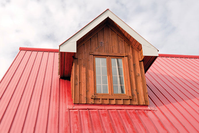 A house with a red metal roof