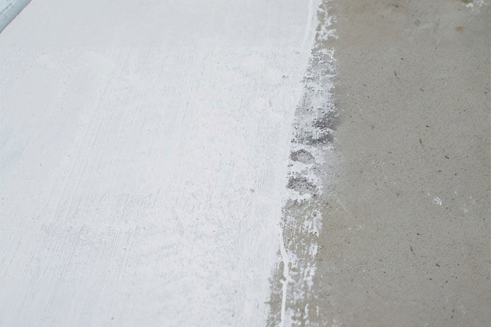 White roof coating curing on the surface