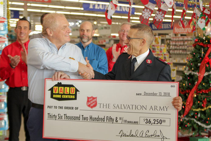 Valu Home Centers presenting The Salvation Army with check