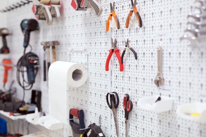 tools hanging on garage wall 
