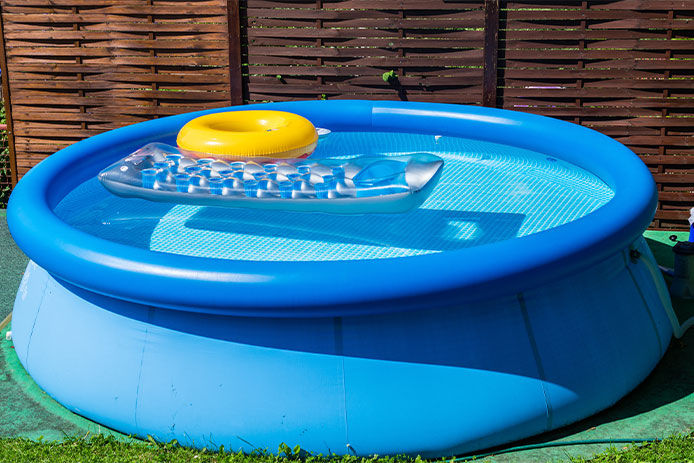 An inflatable above ground pool