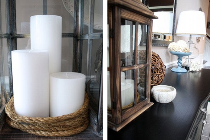 white candles and wood lantern
