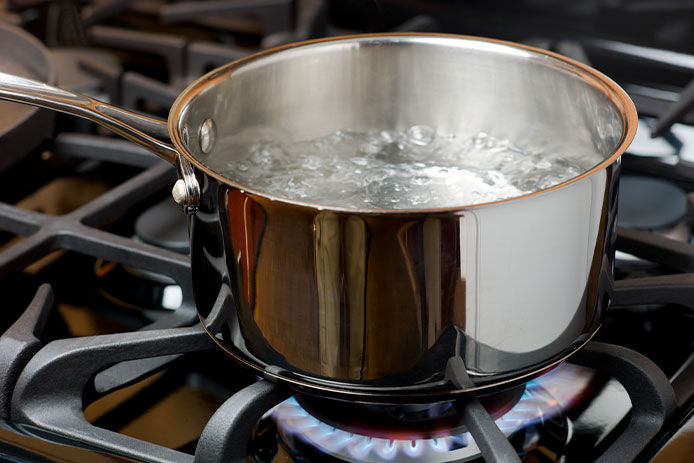 Boiling pot of water on a gas stove