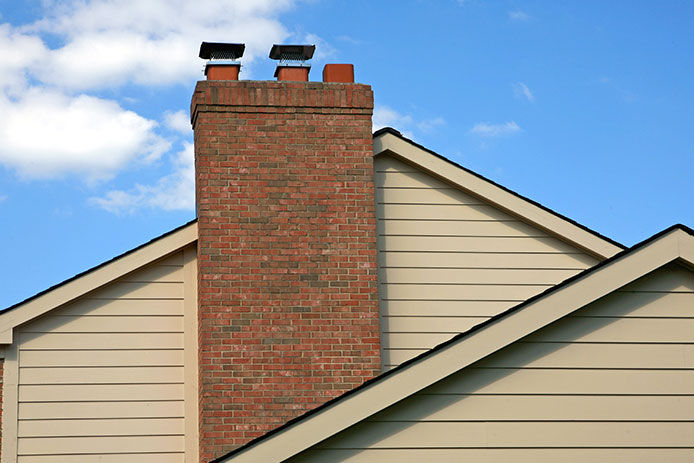 Brick chimney on a house