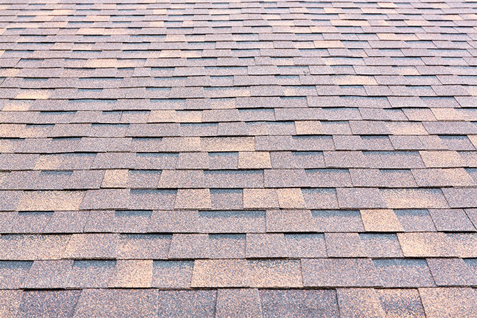 Brown shingles on a residential roof top