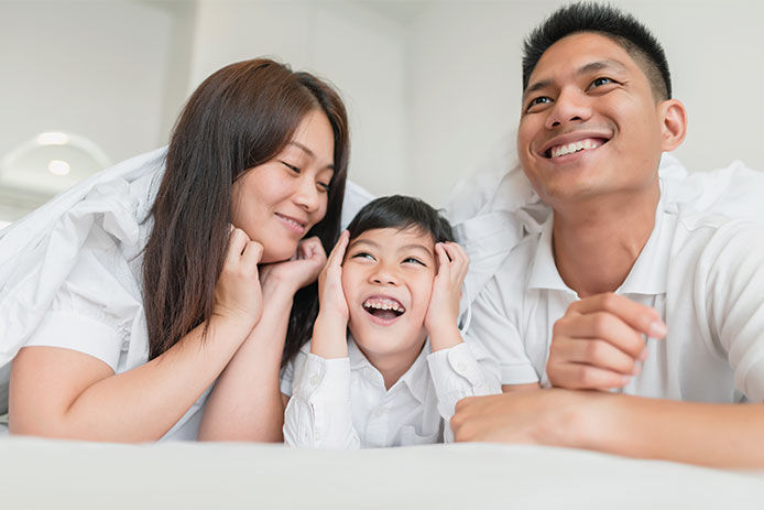 Family laughing and smiling