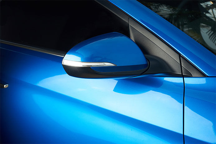 The exterior of a blue sedan