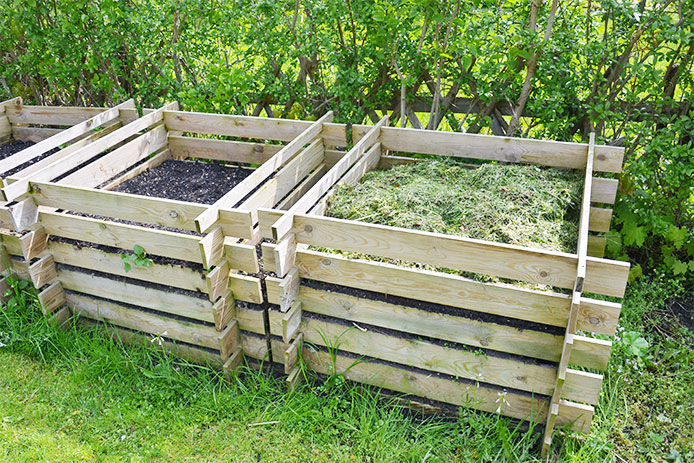 Compost boxes built with 2x4 wood