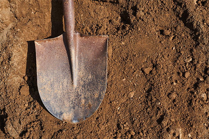 Shovel on soil backgound.Gardening.