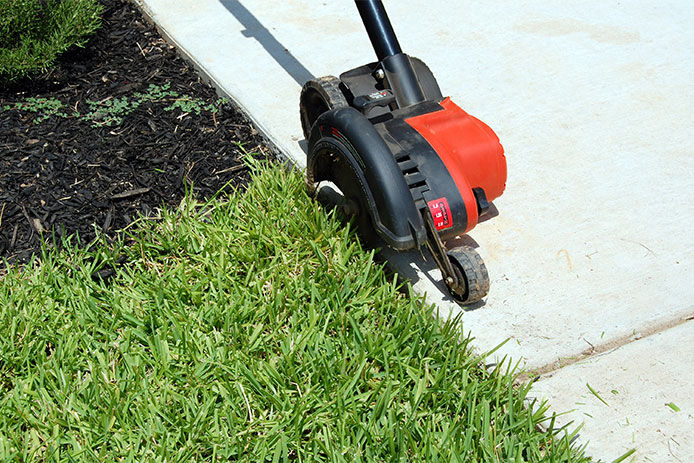 Using a lawn edger 