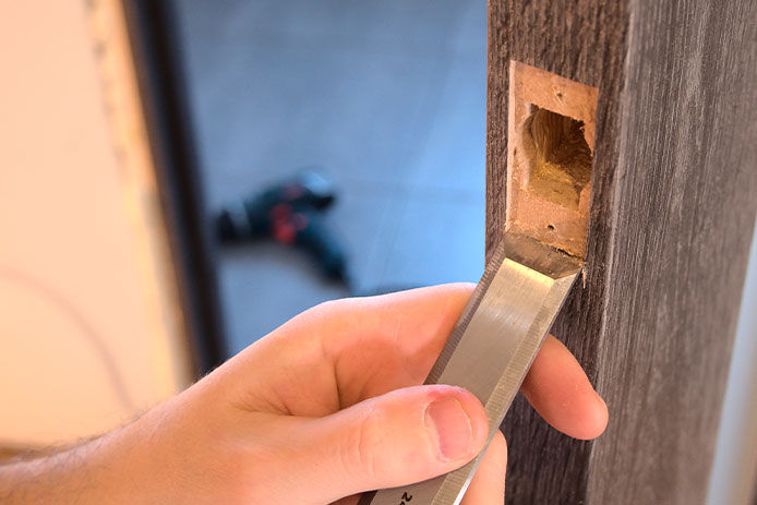 A person filing a doorway 