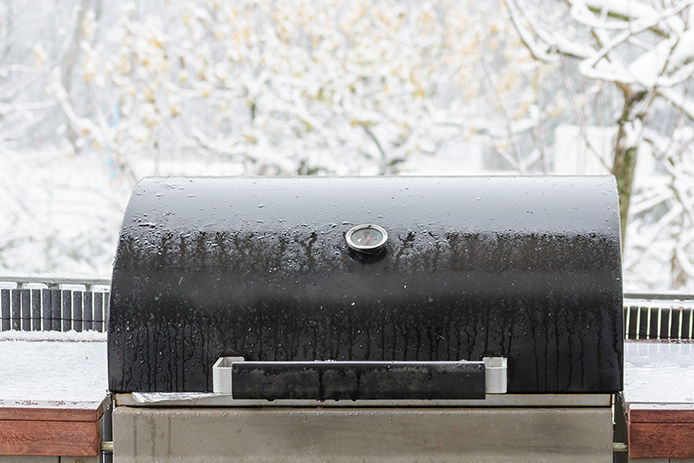 BBQ on the balcony in the snowstorm.