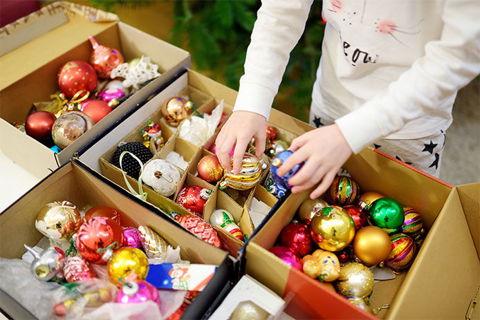 Christmas ornaments packed away in boxes