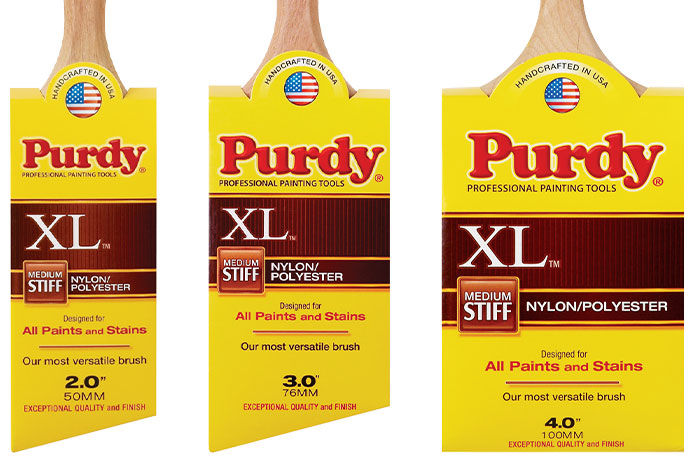 Three different sizes of Purdy XL nylon/polyester paint brushes in the original packaging 