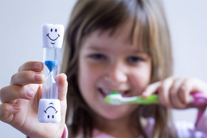 Kid brushing teeth