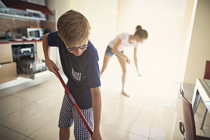 People mopping kitchen floor