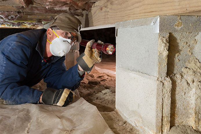 Man in a crawl space