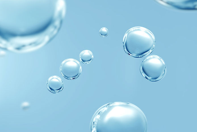A close-up of small air bubbles in water