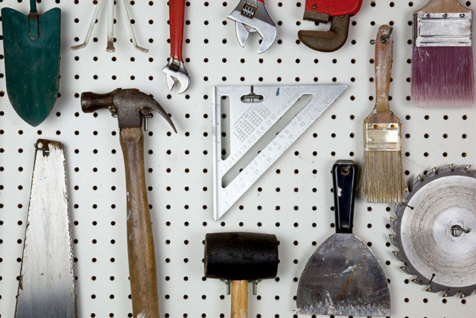 Tools hanging up on a peg board