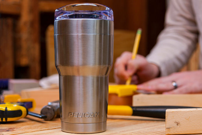 A Stainless steel Pelican tumbler 